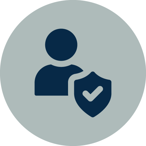 A dark silhouette of a person with a shield and checkmark symbol, indicating security or protection, set against a gray circular background.