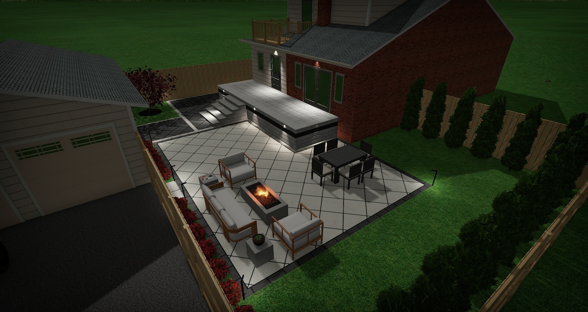 Modern patio setup with fire pit, seating area, and dining table, adjacent to a brick house and garage, surrounded by greenery.